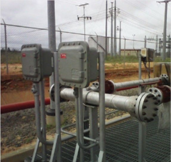 Electrical junction boxes and instruments mounted on the station piping.