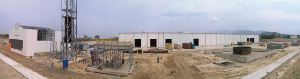 Trujillo plant: panoramic view of the site with the main building, the stack tower and the areas under construction.